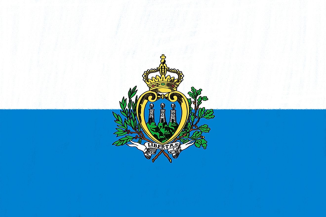 The National Flag of San Marino features two equal horizontal bands of white (top) and light blue with the national coat of arms superimposed in the center.