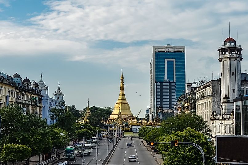 The Sule Buddhist Pagoda, likely built before 500 BC, rises up amidst 21st Century office buildings in Yangon.