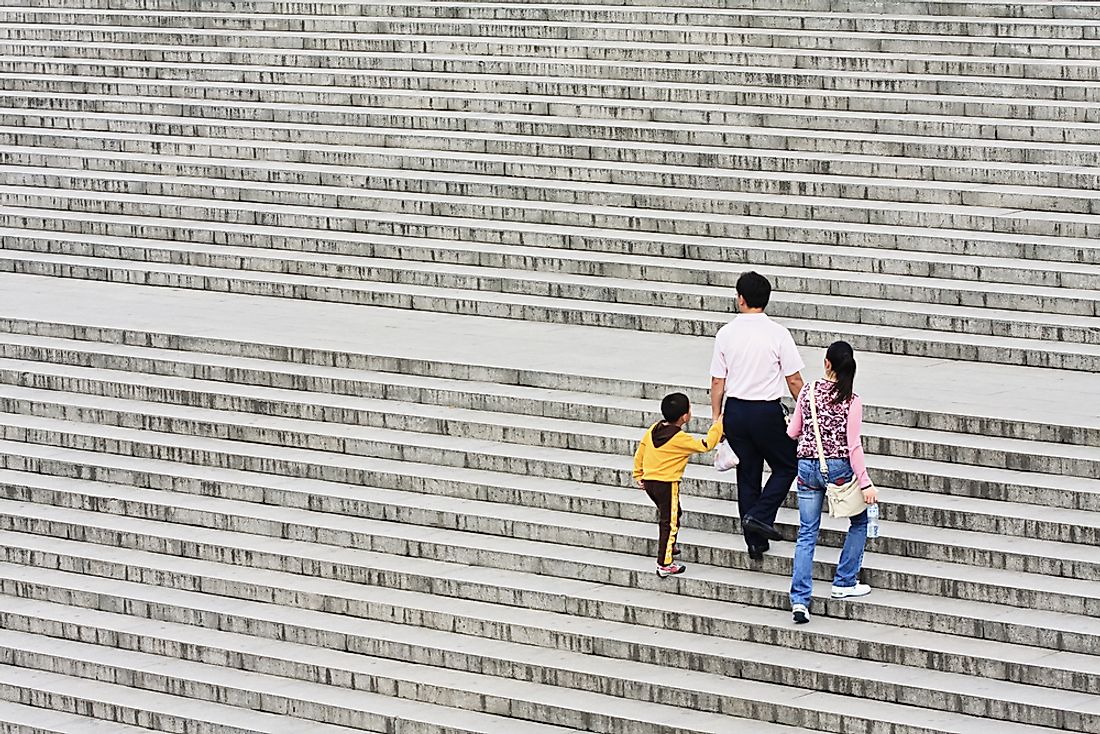 A family with one child in China. Editorial credit: TonyV3112 / Shutterstock.com. 