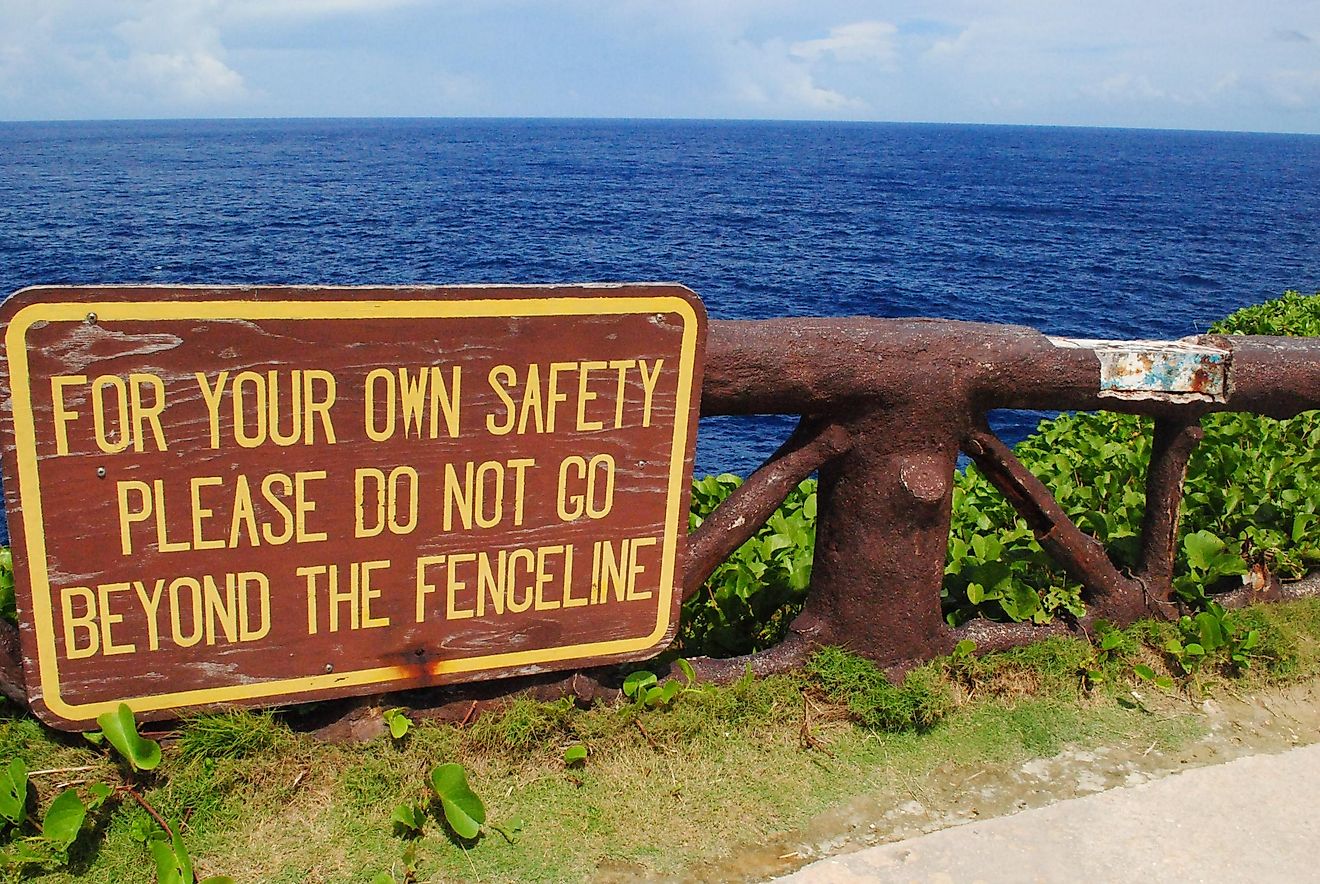 Sign on the railings at Banzai Cliff, a World War 11 historical site on Saipan, Northern Mariana Islands.