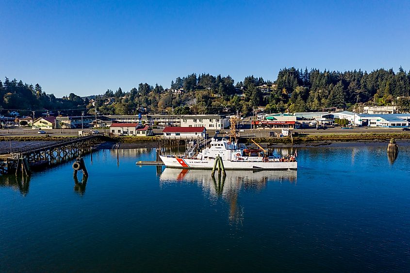 Coos Bay Oregon, aerial Pacific Highway 101 going through town, via Manuela Durson / Shutterstock.com
