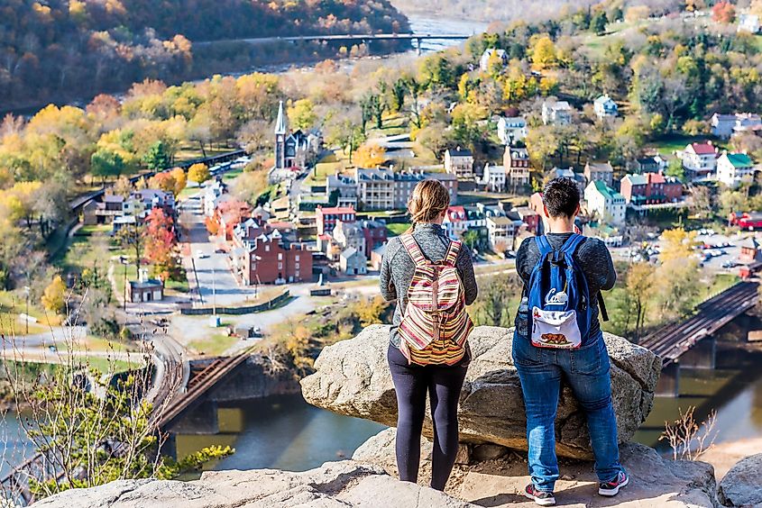 A couple on a hike overlooking Harpers Ferry, West Virginia