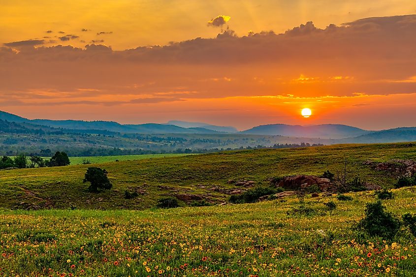 A scenic view of the Wichita Mountains at sunrise.