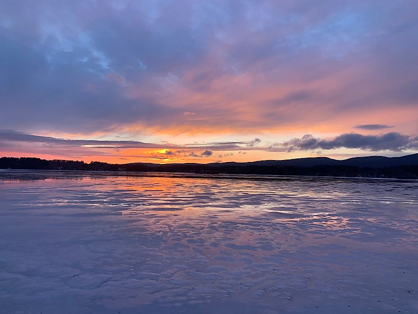 Iced lake at sunset in Massachusetts.