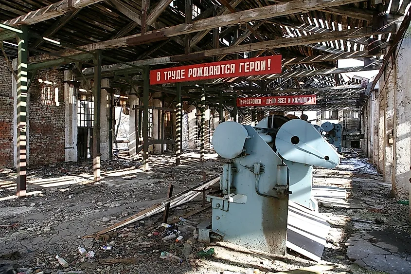 An old factory in the Soviet Union showing slogans from "perestroika".
