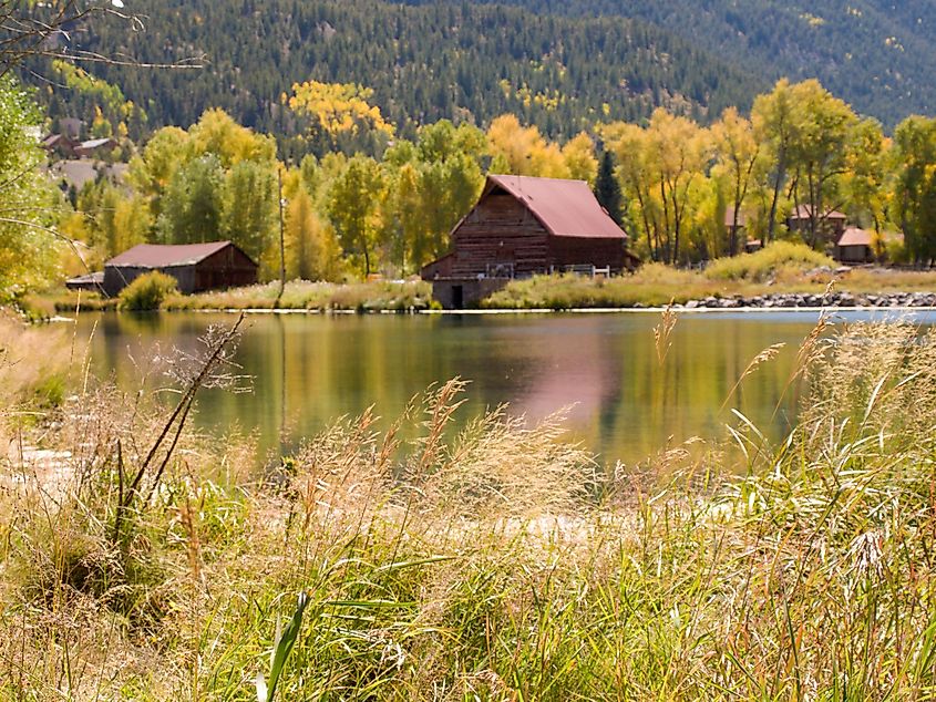 Old barn by the lake in autumn. Near Lake City, Colorado.