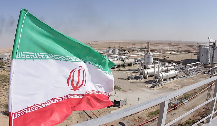 Oil and gas refineries with the flag of Iran