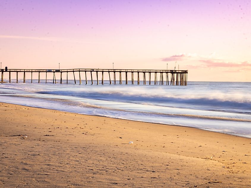 Peaceful long exposure photograph of the Ocean City, Maryland.