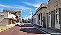 Downtown Natchitoches buildings and streets in the autumn. Editorial credit: VioletSkyAdventures / Shutterstock.com