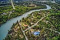 The turquoise waters of the Kenai River flowing along the Chugach Mountains.