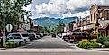 View of buildings and mountains from downtown Whitefish in Montana. Editorial credit: Beeldtype / Shutterstock.com