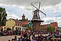 Downtown Pella, Iowa, during the Tulip Time Festival Parade. Image credit yosmoes815 via Shutterstock