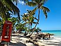 British phone booth on the beach at St. John's, Antigua and Barbuda.