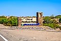  welcoming signboard at the entry point of Elephant Butte, New Mexico. Editorial credit: Cheri Alguire / Shutterstock.com.