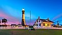 View of the lighthouse on Tybee Island, Georgia, at dusk.