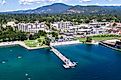 Aerial view of the beach with families enjoying the sunshine and lake Coeur d'Alene, Idaho. Editorial credit: Nature's Charm / Shutterstock.com