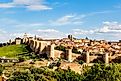 Panoramic view of the historic city of Avila from the Mirador of Cuatro Postes, Spain, with its famous medieval town walls. 