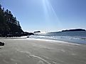 The sun's spotlight illuminates Tonquin Beach in Tofino, British Cololmbia, Canada. Photo: Andrew Douglas