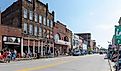 Buckhannon, West Virginia, USA - May 18, 2019: The Historic Building along Main Street, with locals and tourist walking along, waiting for the parade