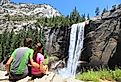 Hikers resting in Yosemite National Park at Vernal Falls.