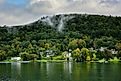 Cooperstown, New York: Homes along the shore of Ostego Lake, the source of the Susquehanna River, via Steve Cukrov / Shutterstock.com