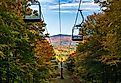 View down Mount Mansfield with ski lift chairs.