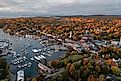 Panoramic view of Camden Harbor in Maine at sunrise during autumn.