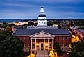 Maryland State House, in Annapolis, at dusk. Image credit: Mihai_Andritoiu via Shutterstock