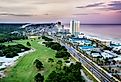 Panama City Beach, Florida, view of Front Beach Road at sunrise.