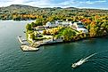 Fall foliage by Lake George at sunset. Photos are taken by drone.