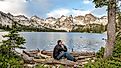 Relaxing by the Alice Lake in the Sawtooth Wilderness Area of Idaho. 