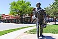 Bronze sculpture of Wyatt Earp as part of the Trail of Fame in the historic district of Dodge City, Kansas. Image credit Michael Rosebrock via Shutterstock