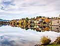 Mountain Village in Autumn and Reflection in Water. Lake Placid, Upstate New York