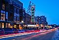 Fargo, North Dakota. Lights on Fargo Theater with street lined with cars. Image credit FiledIMAGE via AdobeStock.