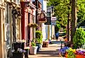 Quaint shops and businesses dating back more than a century line Hudson Ohio's Main Street looking north. Image credit Kenneth Sponsler via Shutterstock