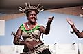 A dancer from Kiribati performs at the UN Convention for Climate Change. Editorial credit: dominika zarzycka / Shutterstock.com.