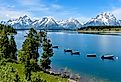 Jackson Lake, spring view of a quiet bay of Jackson Lake, with Teton Range rising in the background, Grand Teton National Park, Wyoming.