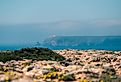 Cabo de San Vicente is a geographical feature located in the extreme southwest of Portugal, which marks the western limit of the Gulf of Cadiz. Image credit martinscphoto via AdobeStock.