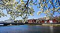 View from Westport bridge over Saugatuck River and architecture near downtown Westport, Connecticut on a beautiful spring day. Editorial credit: Miro Vrlik Photography / Shutterstock.com