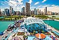 Navy Pier and skyline in Chicago, Illinois. Image credit f11photo via Shutterstock