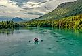 Kenai River on the Kenai Peninsula in the summer. Image credit Dana via Adobe Stock. 