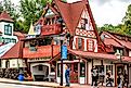 Traditional Bavarian-style building with red roof tiles on Main Street in Helen, Georgia. Editorial credit: Kristi Blokhin / Shutterstock.com