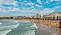 People on La Grande Plage - the Great Beach in Biarritz, France. Editorial credit: Roaming Pictures / Shutterstock.com