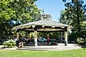 People walk through performance pavilion in the central square in the Sonoma County wine country town of Healdsburg, California