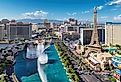 Aerial view of fountain show and Las Vegas strip in Nevada at sunset.