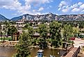 Estes Park, a sunny Summer day view of the center of the mountain resort town along Big Thompson River, Colorado.