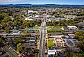 Aerial view of the city of Rome, Georgia with the mountains in the background.