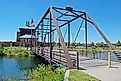 Kearney, Nebraska, USA - the Archway Monument behind an old metal bridge. Editorial credit: Mystic Stock Photography