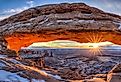 The winter sun rises on a cold January morning at Mesa Arch in Canyonlands National Park, Utah. Image credit Colin D. Young via Shutterstock