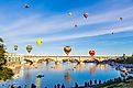 Hot air balloons flying above London Bridge in Lake Havasu.